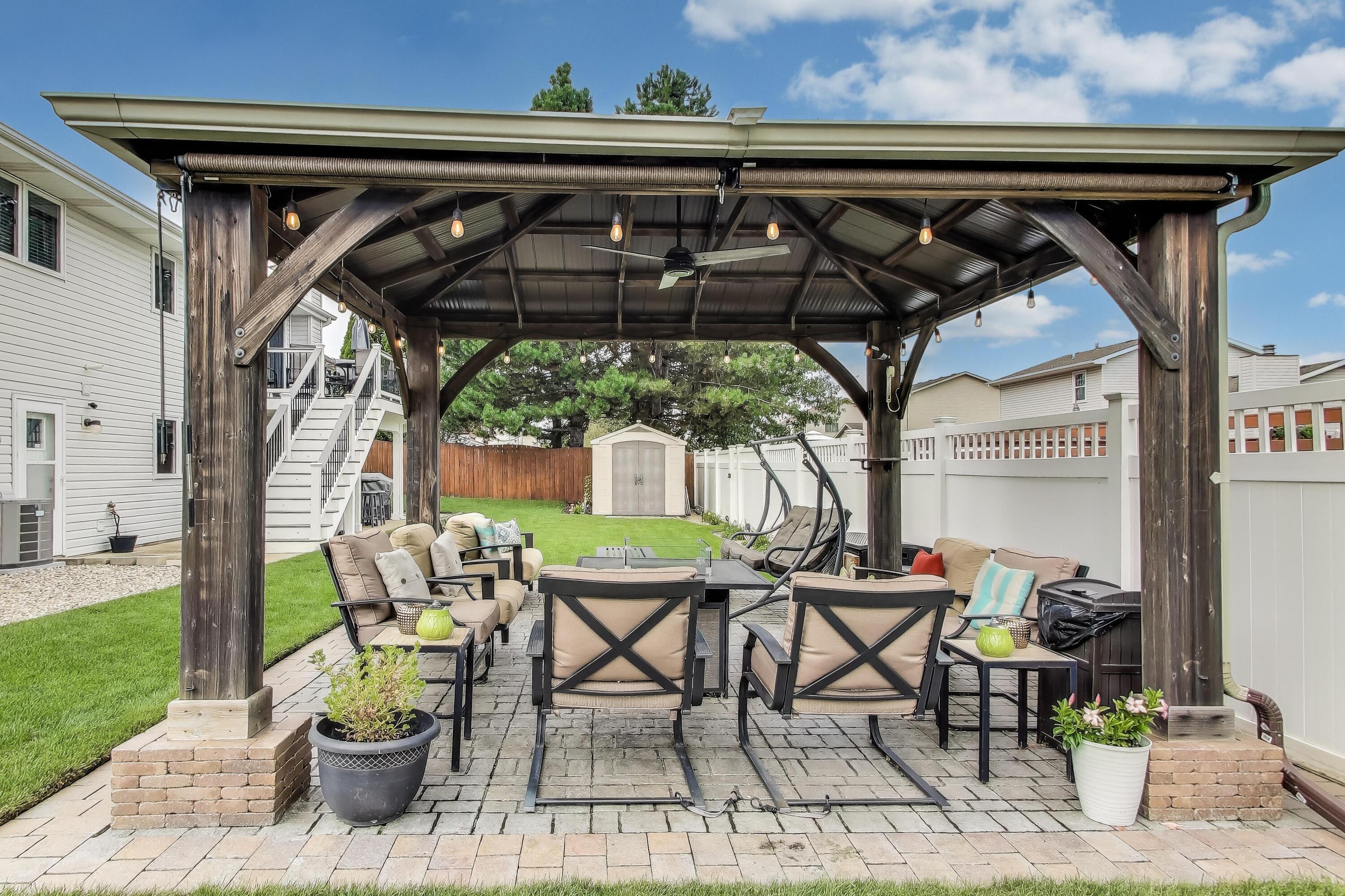 2903 Morningside Drive Crown Point, IN 46307 - Photo 37 of 39 a patio with a table and chairs