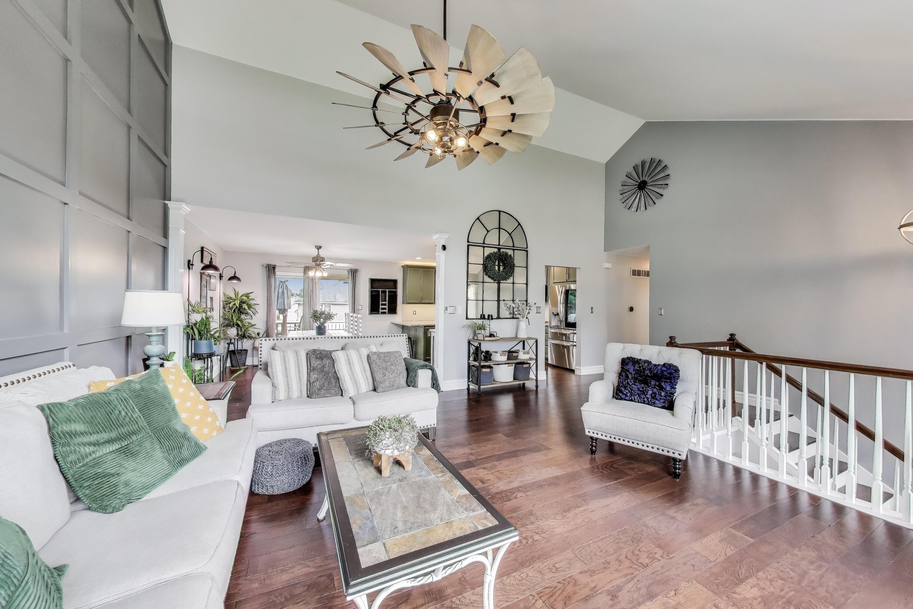 2903 Morningside Drive Crown Point, IN 46307 - Photo 6 of 39 a living room with fireplace furniture and a chandelier