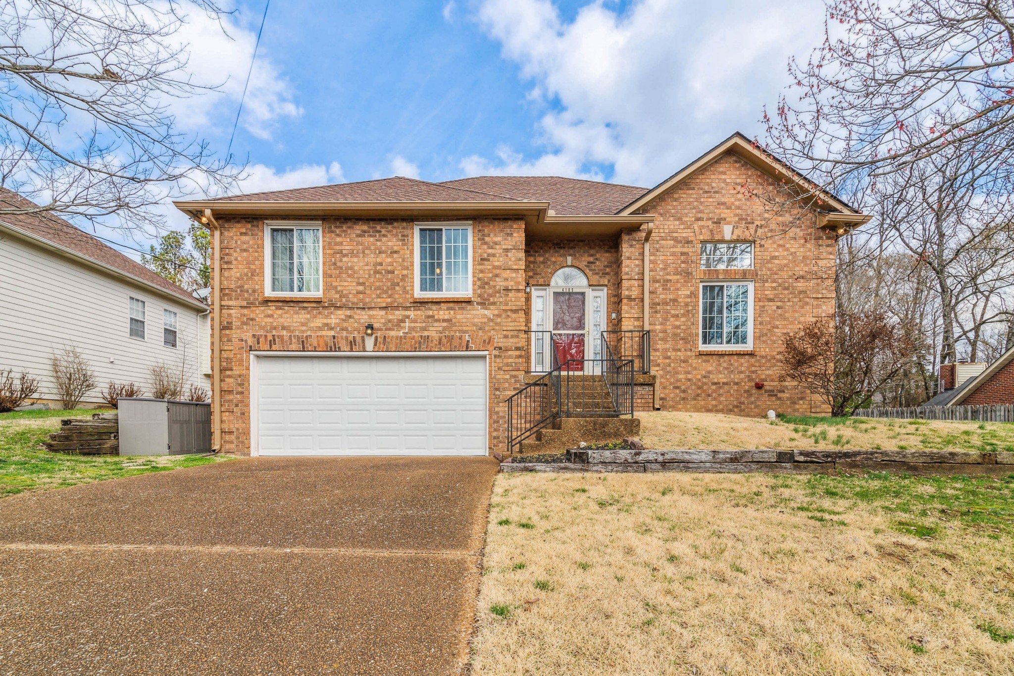 4105 New Hope Meadow Road Hermitage, TN 37076 - Photo 1 of 45 a front view of a house with a yard