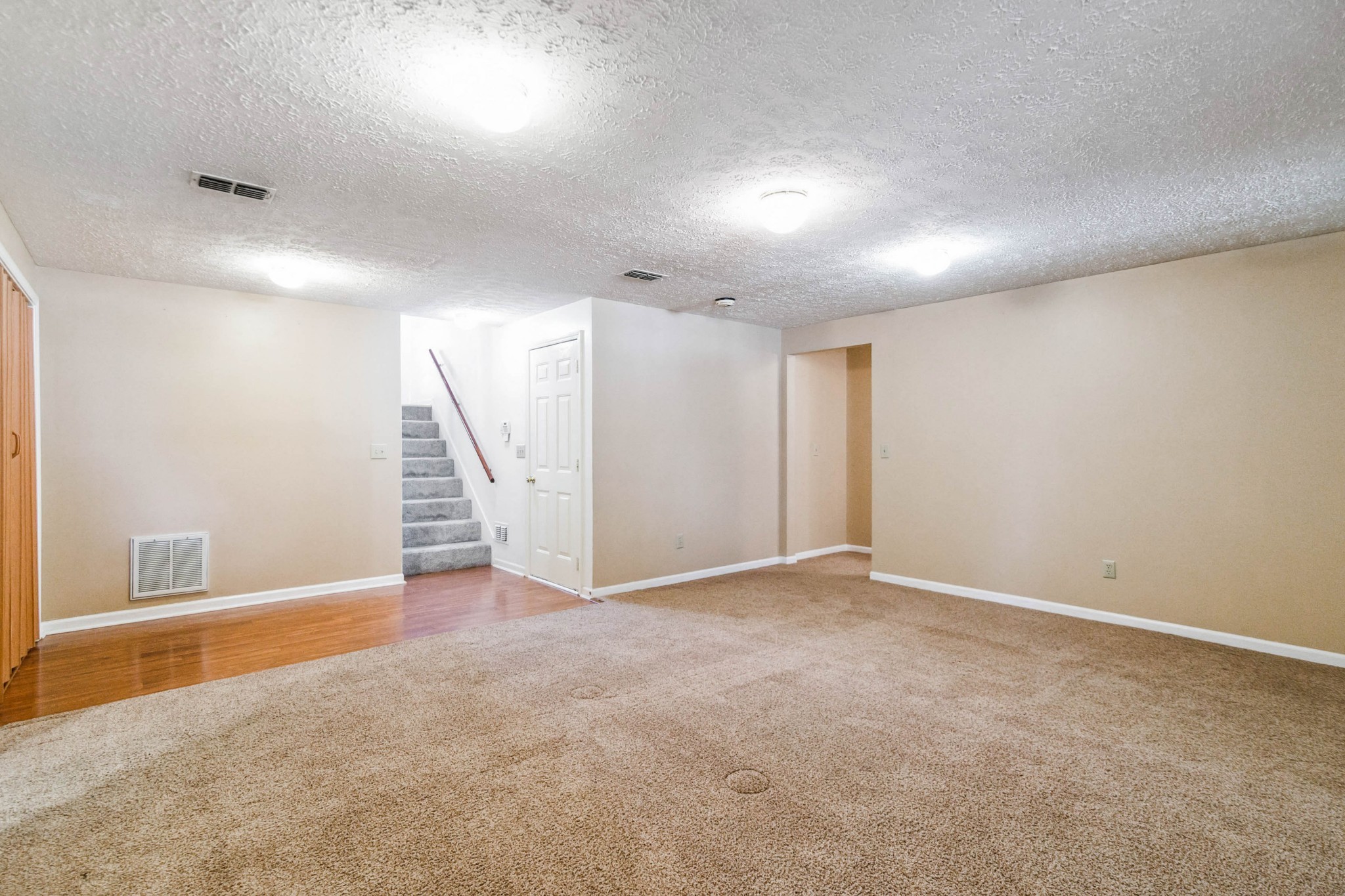 4105 New Hope Meadow Road Hermitage, TN 37076 - Photo 22 of 45 an empty room with a white wall and door