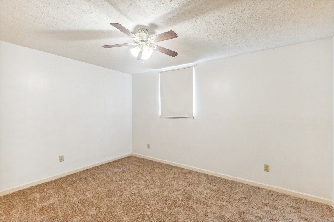 4105 New Hope Meadow Road Hermitage, TN 37076 - Photo 24 of 45 an empty room with chandelier fan