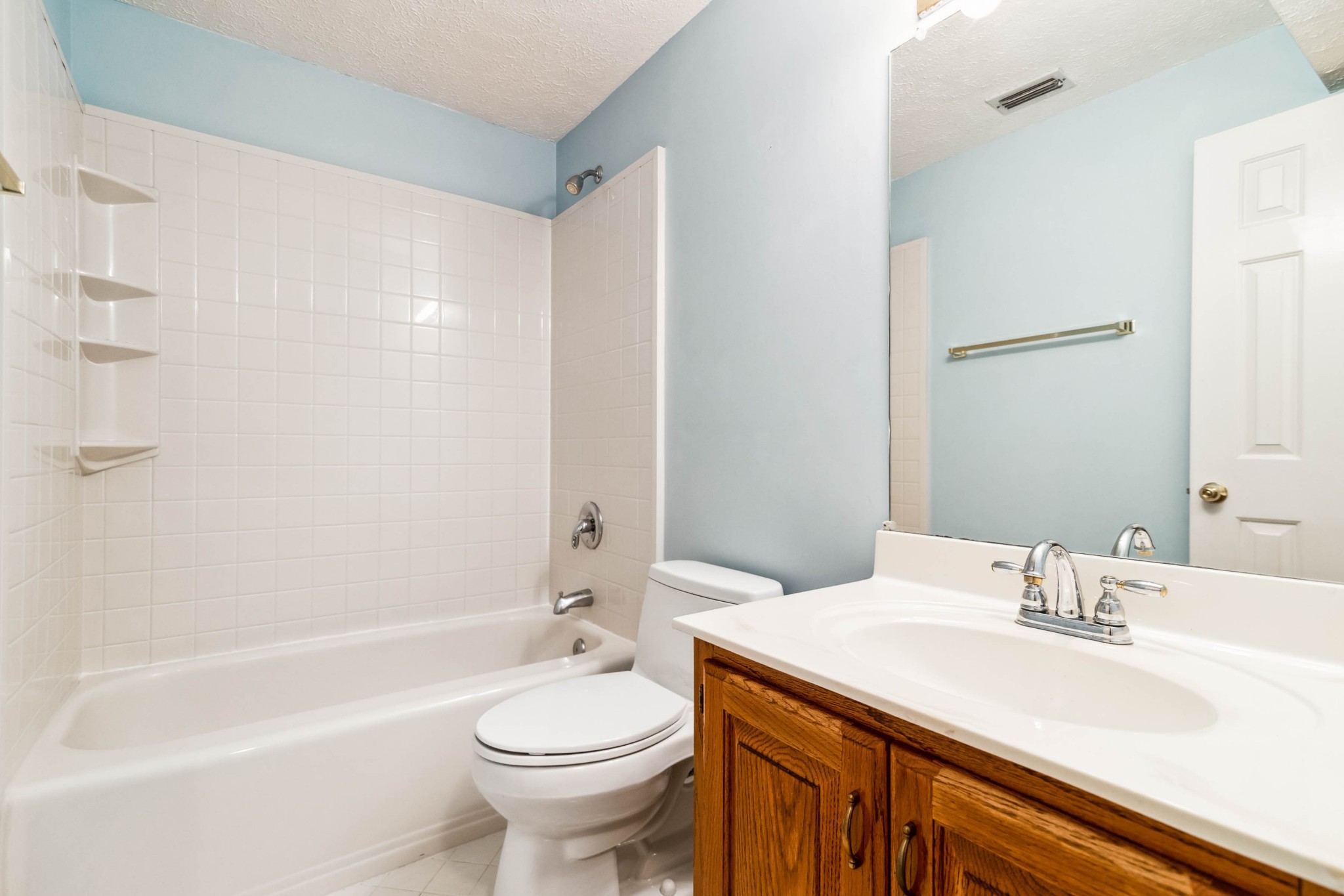4105 New Hope Meadow Road Hermitage, TN 37076 - Photo 25 of 45 a bathroom with a sink a toilet and a bathtub