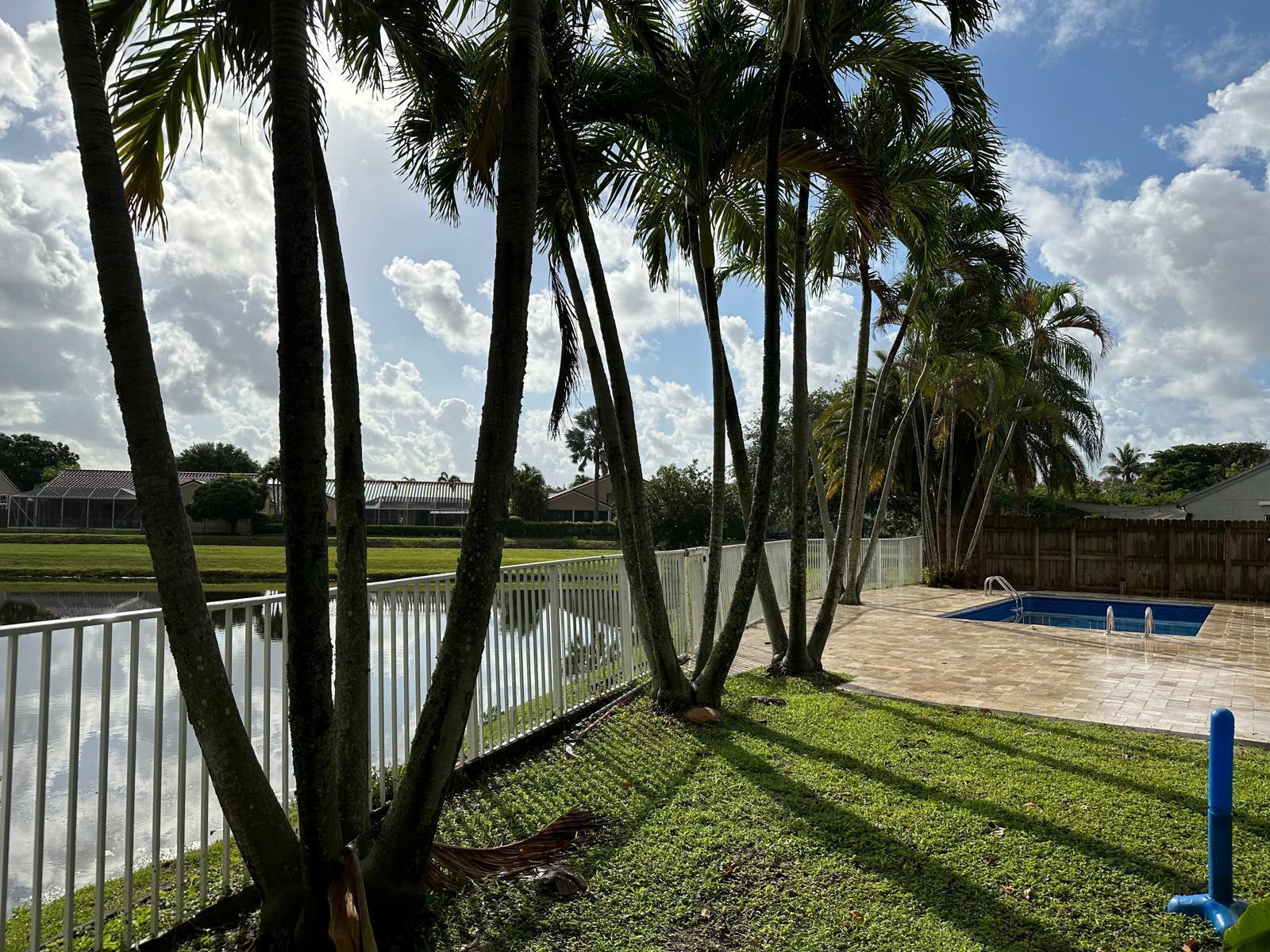 9841 Ridge Creek Road Boca Raton, FL 33496 - Photo 5 of 24 a view of swimming pool from a balcony