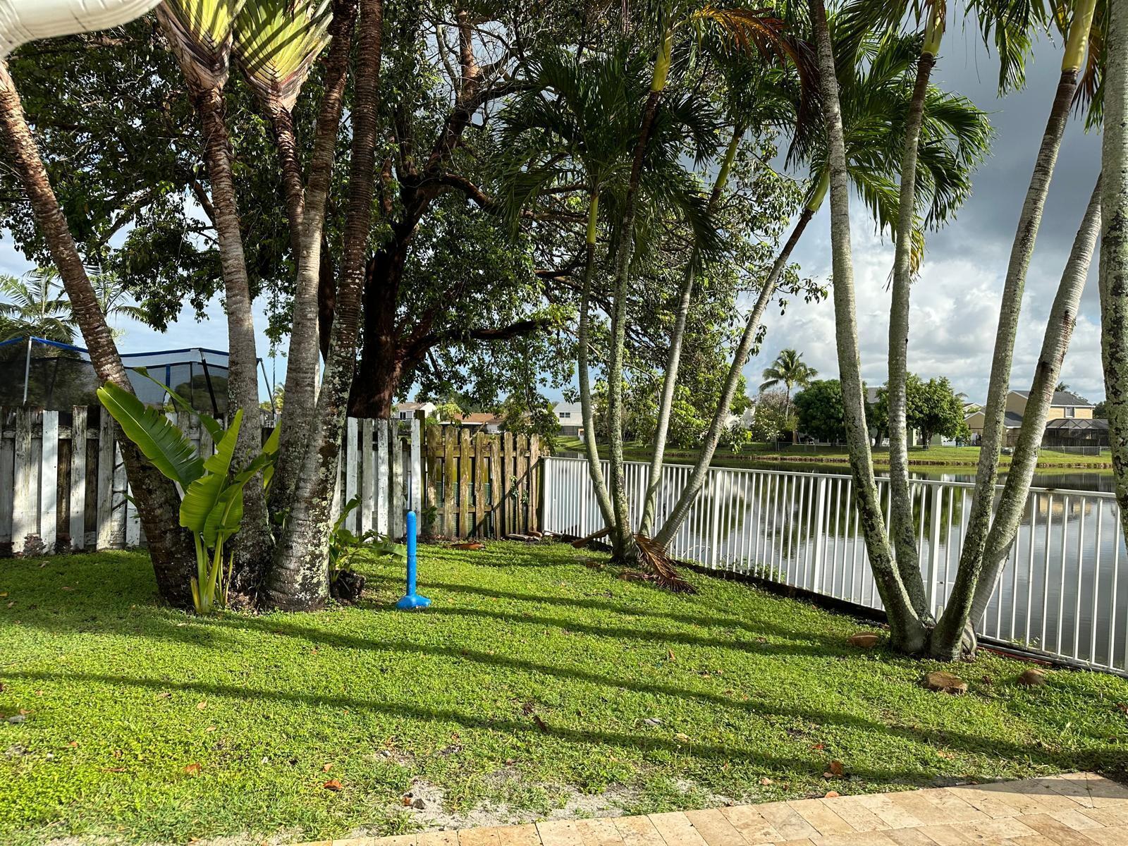 9841 Ridge Creek Road Boca Raton, FL 33496 - Photo 7 of 24 a garden view