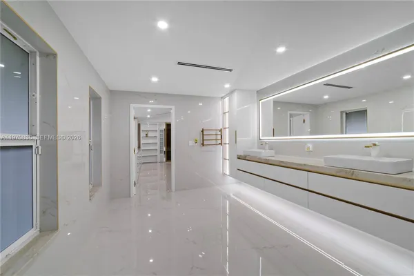 a view of a storage & utility room with washer and dryer