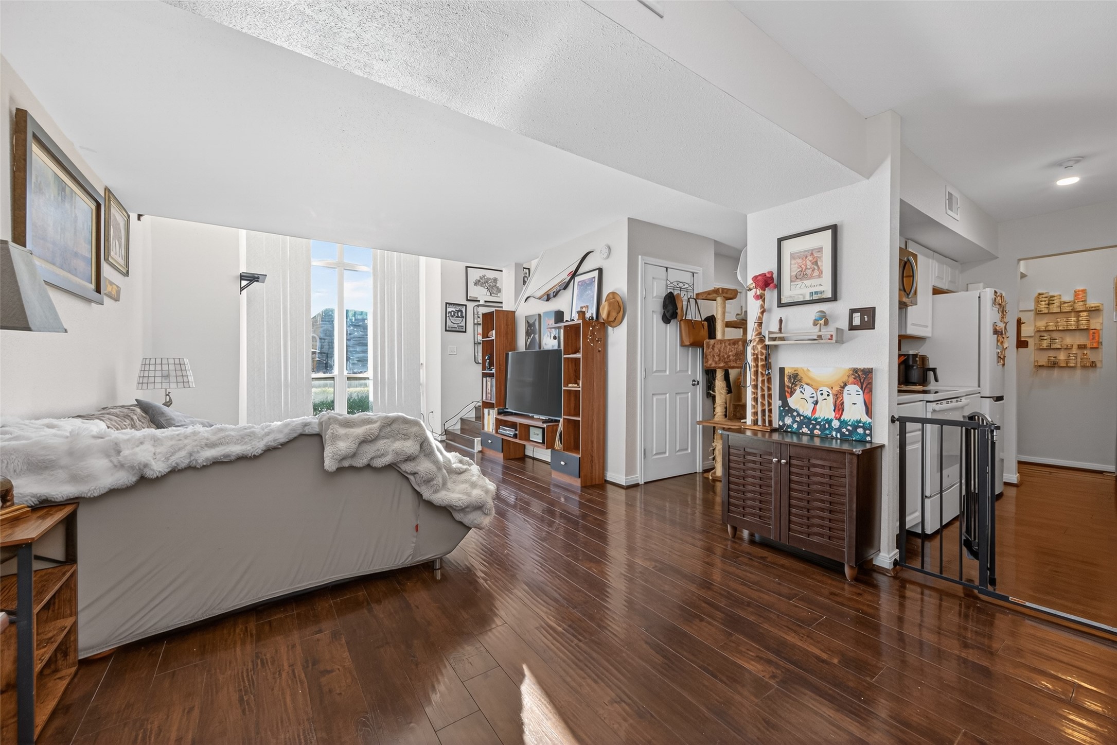 16120 Stuebner Airline Road, Unit 602 Spring, TX 77379 - Photo 11 of 50 a living room with furniture and wooden floor