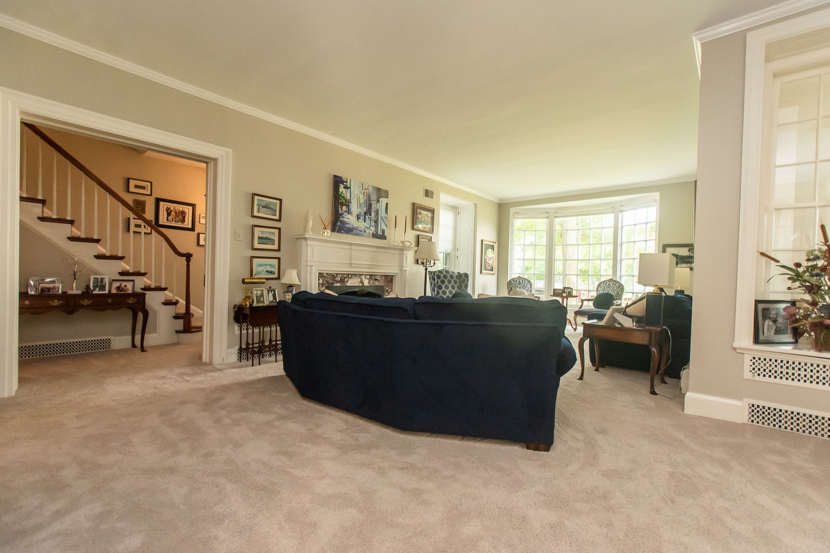 223 East Boyd Street Dixon, IL 61021 - Photo 17 of 74 a living room with furniture and a large window