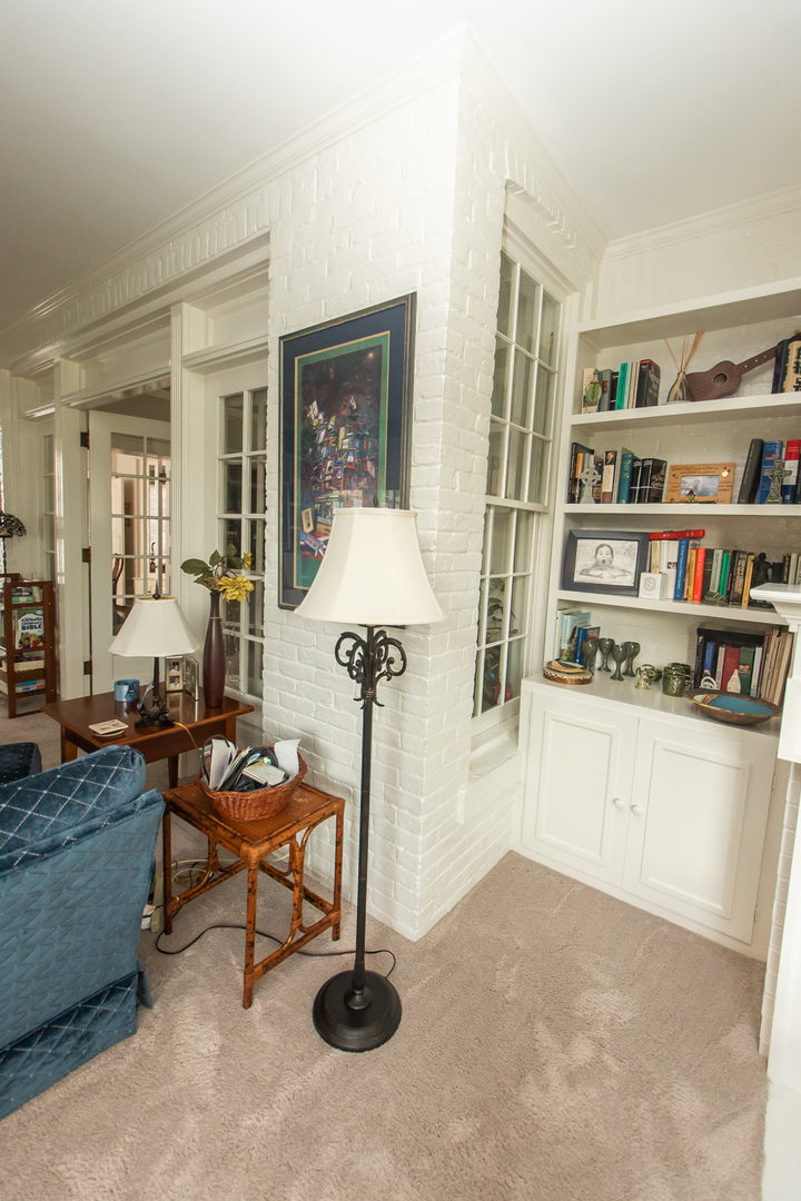 223 East Boyd Street Dixon, IL 61021 - Photo 24 of 74 a living room with furniture a rug and a table