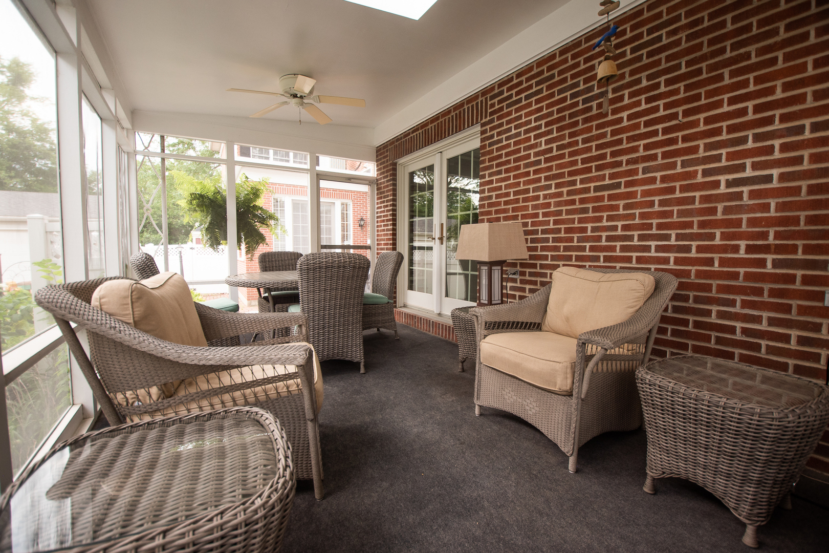 223 East Boyd Street Dixon, IL 61021 - Photo 52 of 74 a living room with furniture and a floor to ceiling window