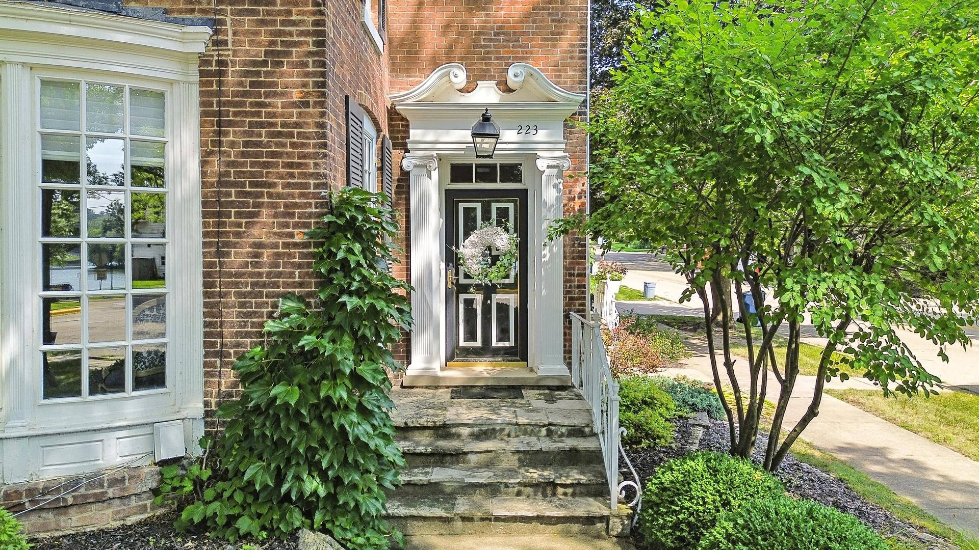 223 East Boyd Street Dixon, IL 61021 - Photo 59 of 74 a front view of a house with a tree