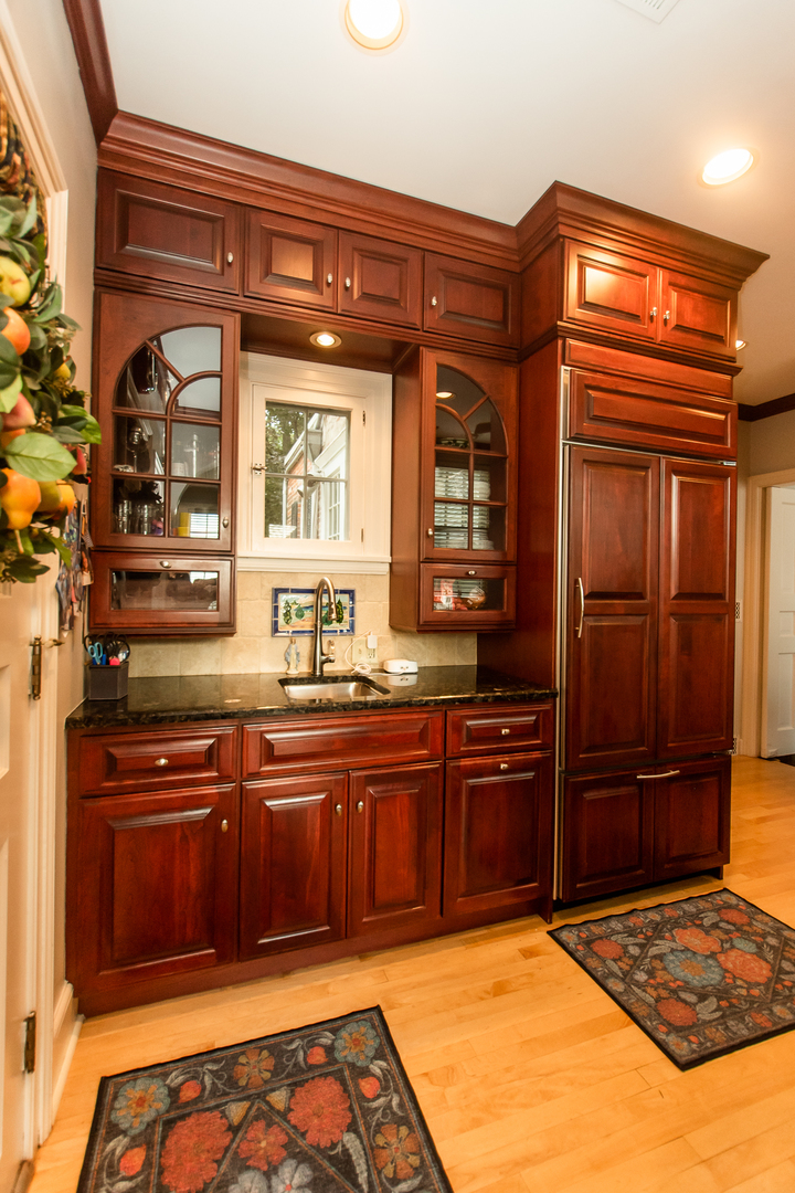 223 East Boyd Street Dixon, IL 61021 - Photo 6 of 74 a kitchen with stainless steel appliances granite countertop a sink and wooden cabinets