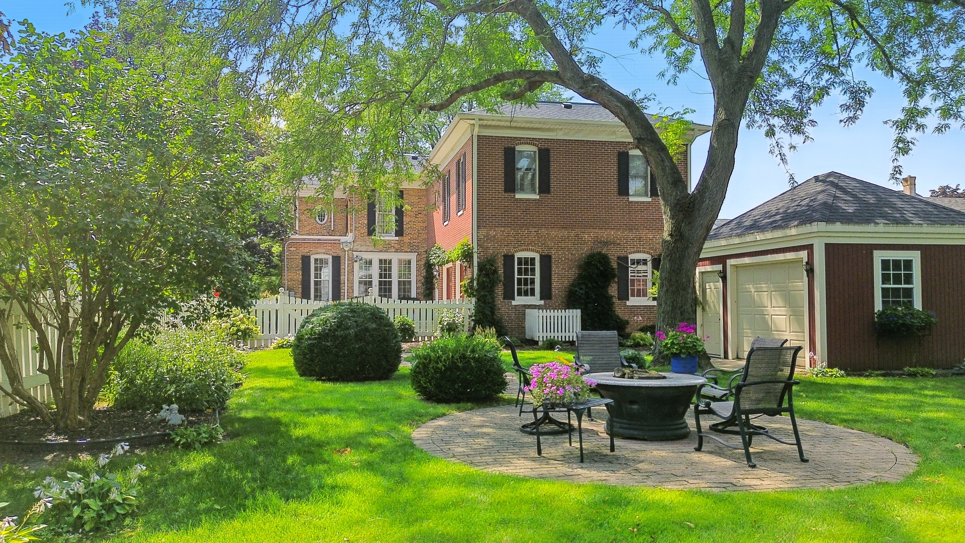 223 East Boyd Street Dixon, IL 61021 - Photo 69 of 74 a view of a house with a backyard and sitting area