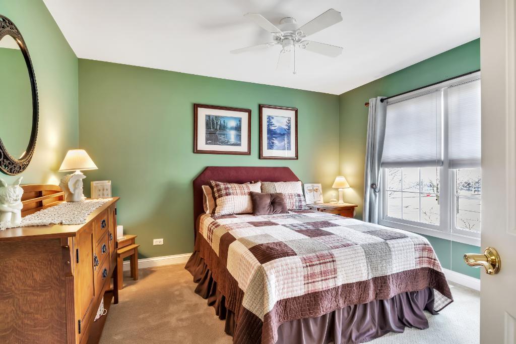 807 Sharp Court Elburn, IL 60119 - Photo 28 of 44 a bedroom with a bed and a window