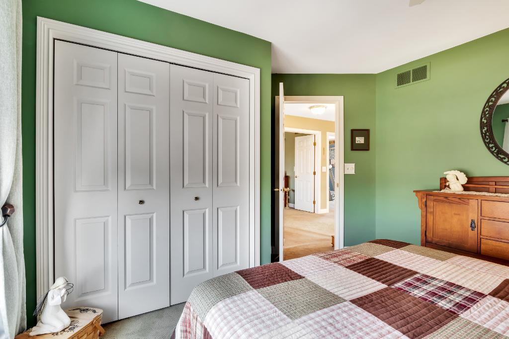 807 Sharp Court Elburn, IL 60119 - Photo 29 of 44 a bedroom with a bed and a window