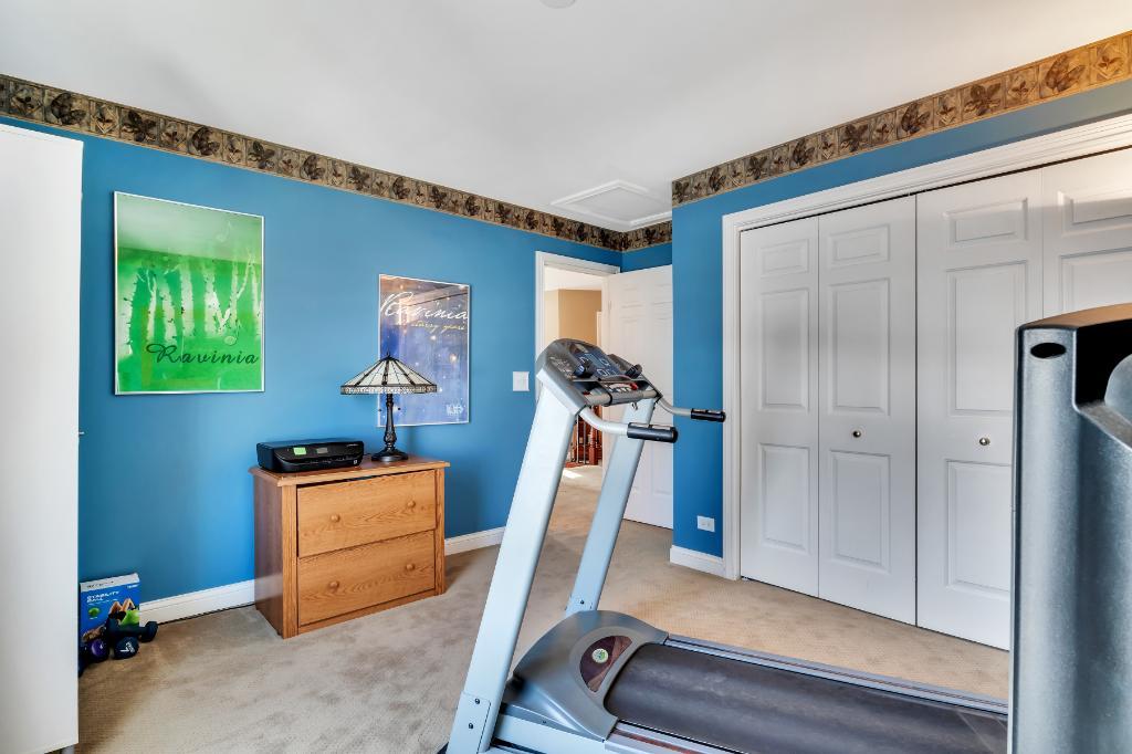 807 Sharp Court Elburn, IL 60119 - Photo 30 of 44 a view of a room with gym equipment