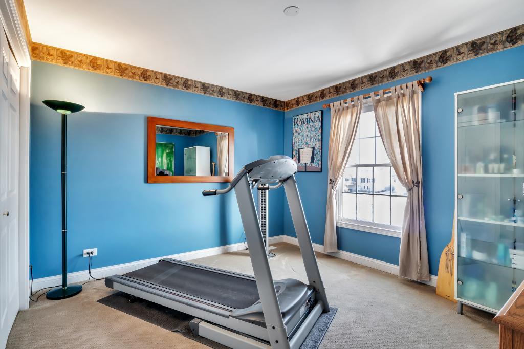 807 Sharp Court Elburn, IL 60119 - Photo 31 of 44 a room with air conditioner and a window