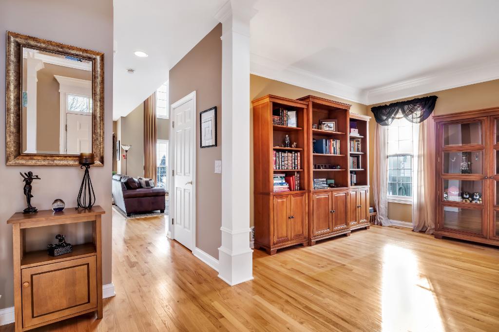 807 Sharp Court Elburn, IL 60119 - Photo 4 of 44 a view of a kitchen with furniture and wooden floor