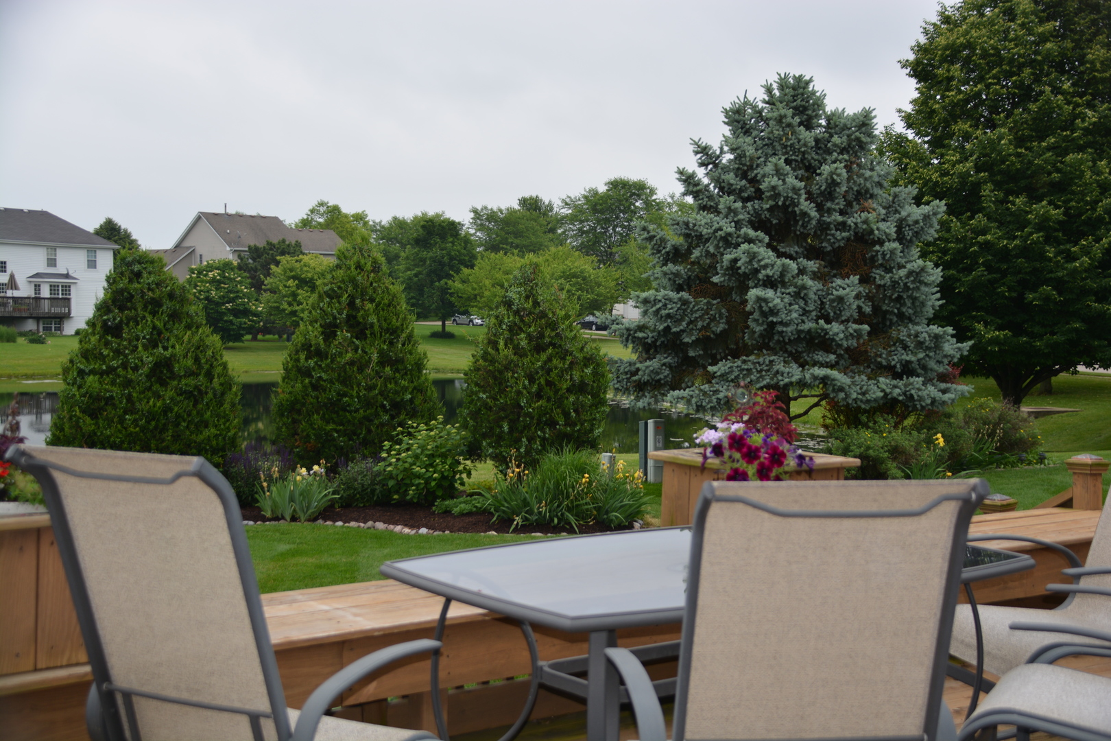 807 Sharp Court Elburn, IL 60119 - Photo 41 of 44 a view of a dining room with furniture and garden