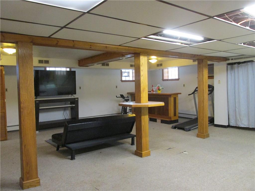 3245 Middletown Road Pittsburgh, PA 15204 - Photo 19 of 24 a living room with furniture and a flat screen tv