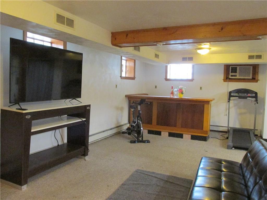3245 Middletown Road Pittsburgh, PA 15204 - Photo 21 of 24 a living room with furniture and a flat screen tv