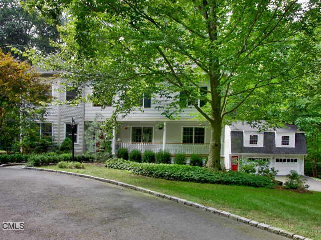 22 Fawn Ridge Lane Fairfield, CT 06890 - Photo 1 of 1 a front view of a house with a yard