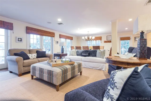 a living room with furniture and a couch