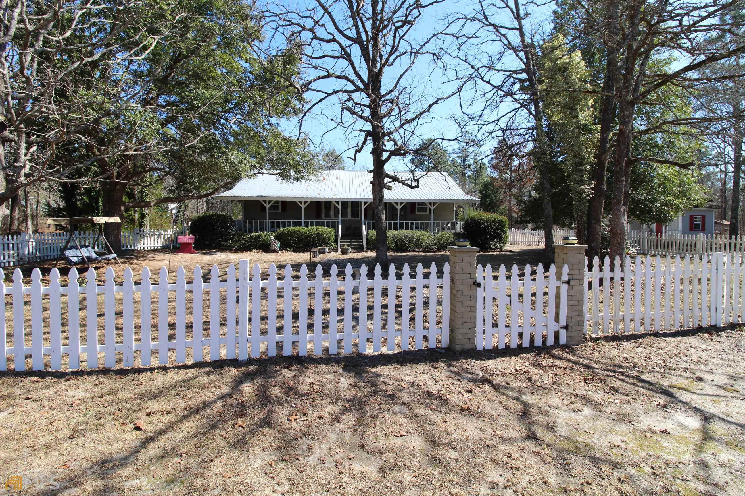 80 Culverhouse Road Butler, GA 31006 - Photo 1 of 1 a view of a wooden fence