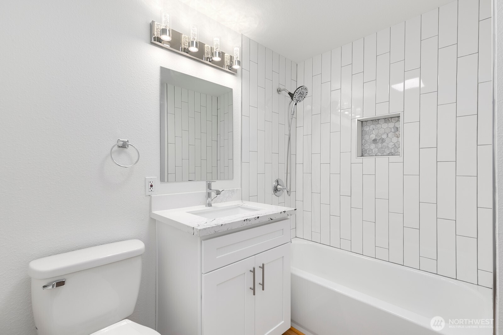 2020 Grant Avenue South, Unit D204 Renton, WA 98055 - Photo 9 of 16 a bathroom with a sink a toilet and shower