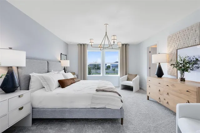 a bedroom with bed and window