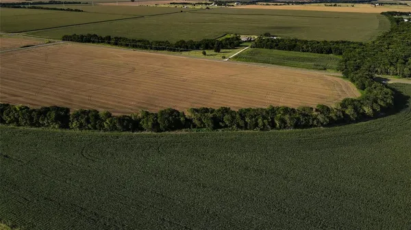 a view of a lake with a big yard