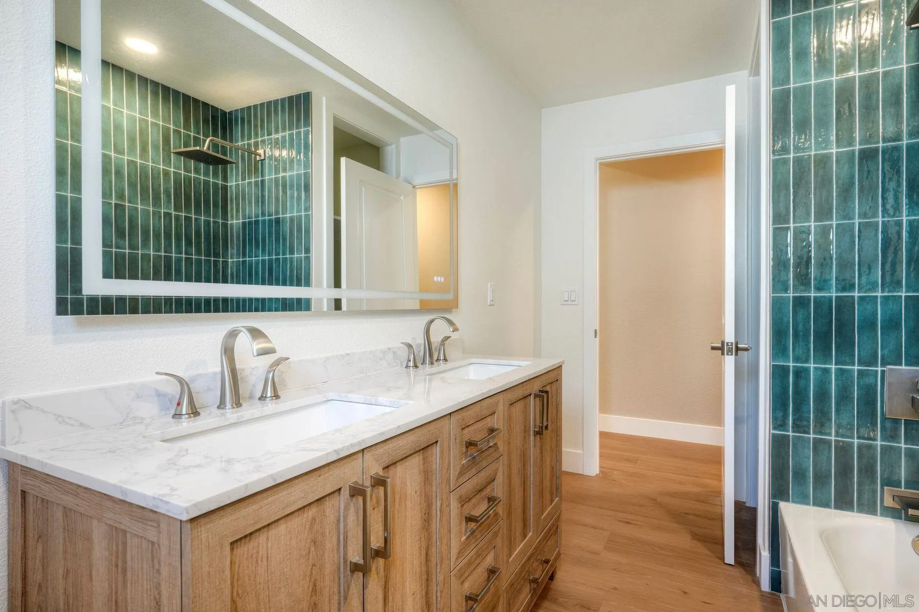 578 East Indian Rock Road Vista, CA 92084 - Photo 18 of 30 a bathroom with a sink and a mirror