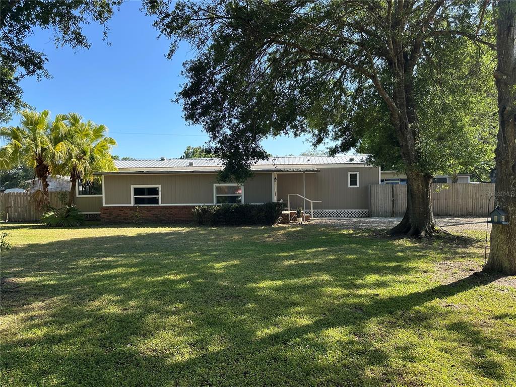 1501 Southeast Plum Drive Arcadia, FL 34266 - Photo 1 of 1 a view of a house with a yard