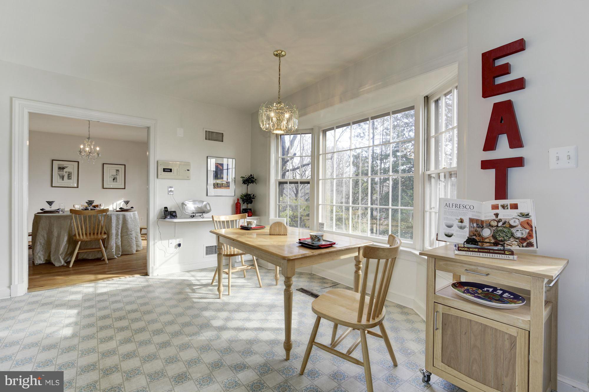 6308 Lenox Road Bethesda, MD 20817 - Photo 12 of 30 a dining room with furniture and window