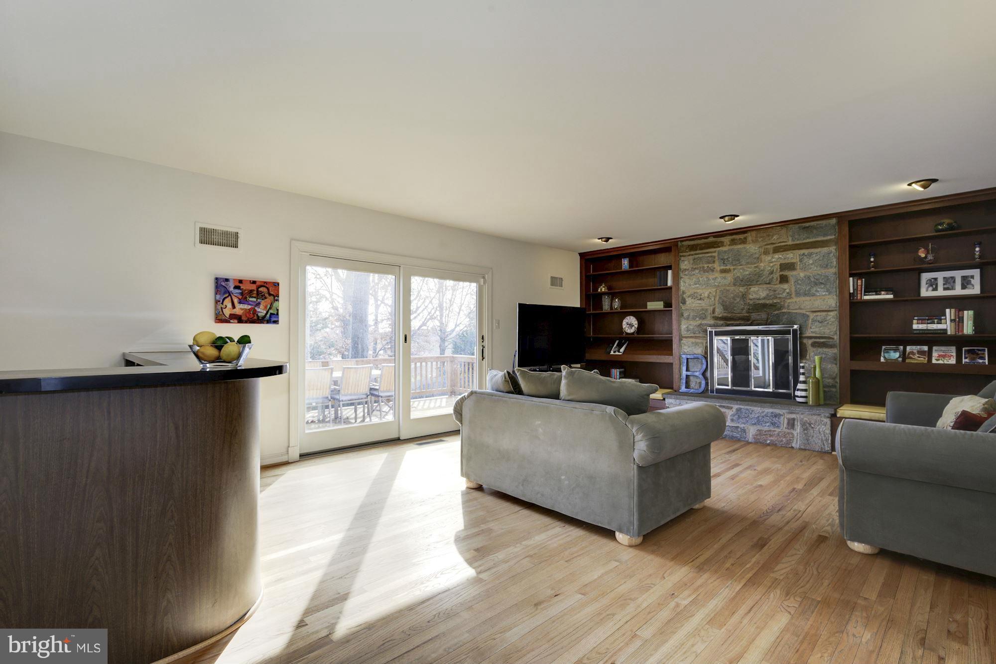 6308 Lenox Road Bethesda, MD 20817 - Photo 13 of 30 a living room with furniture and a flat screen tv