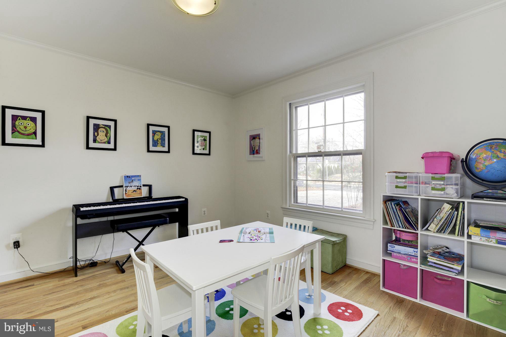6308 Lenox Road Bethesda, MD 20817 - Photo 17 of 30 a view of a workspace with furniture and toys