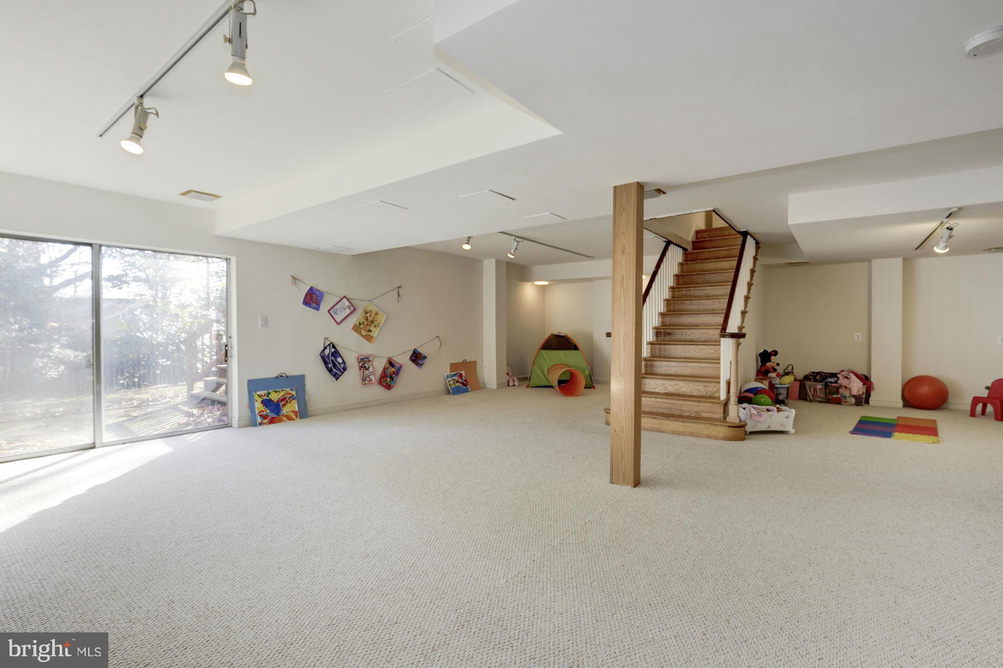 6308 Lenox Road Bethesda, MD 20817 - Photo 25 of 30 a view of a room with gym equipment