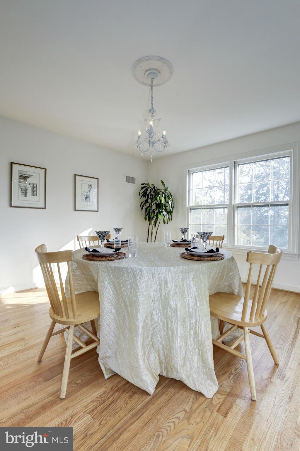 6308 Lenox Road Bethesda, MD 20817 - Photo 8 of 30 a dining room with wooden floor and breakfast area