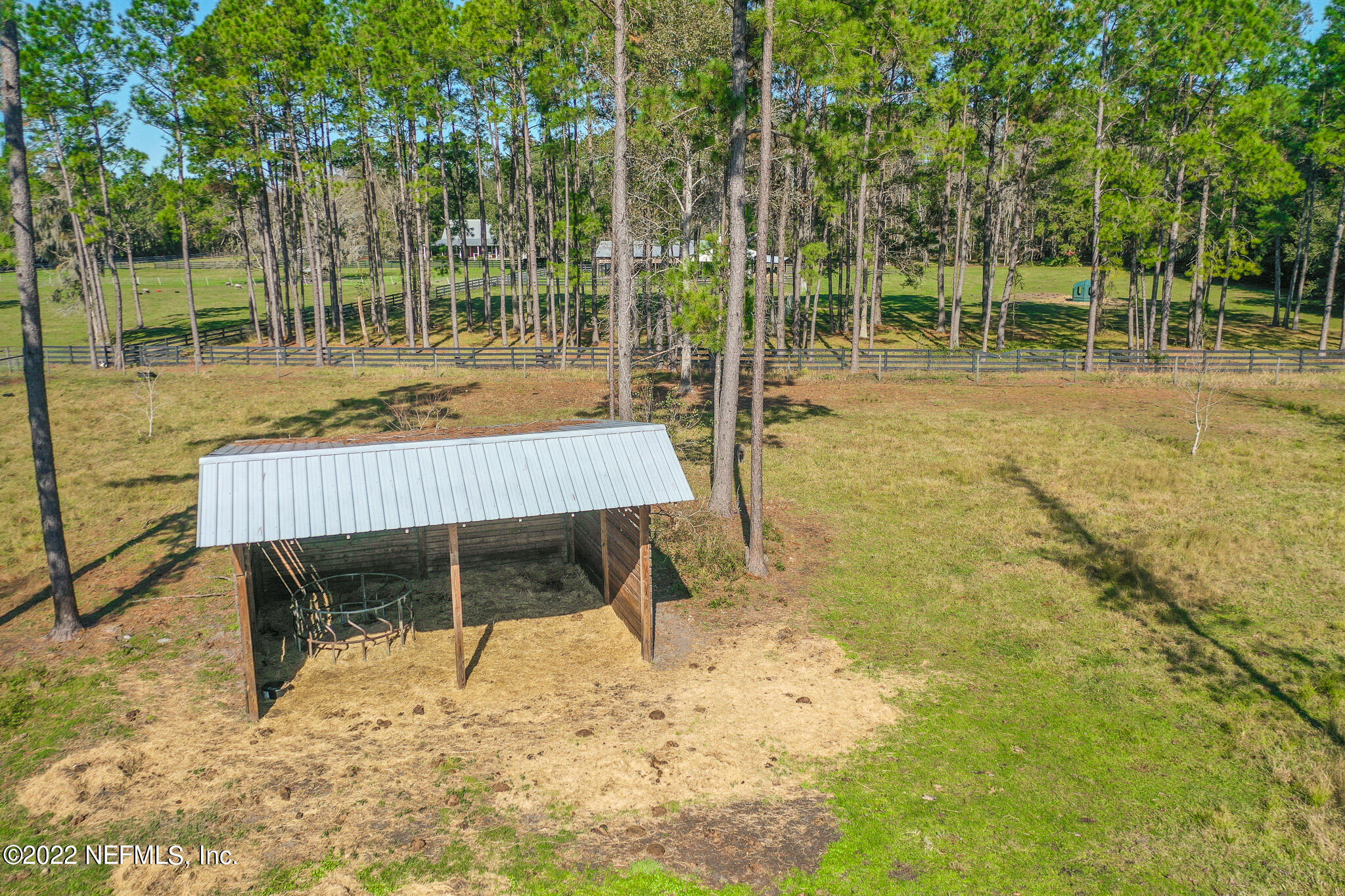 0 Don Manuel Road Elkton, FL 32033 - Photo 6 of 6 a view of a patio with a table chairs and a patio