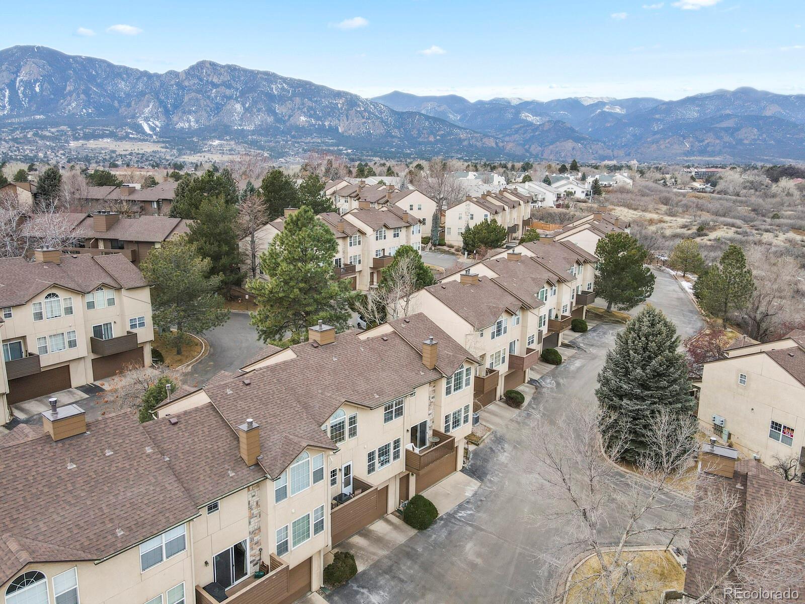 3244 Capstan Way Colorado Springs, CO 80906 - Photo 33 of 37 an aerial view of residential house and green space
