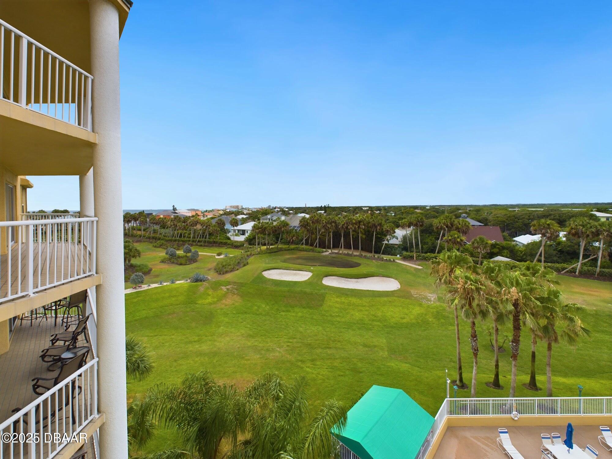 4670 Links Village Drive, Unit C601 Ponce Inlet, FL 32127 - Photo 44 of 68 a view of a balcony with an ocean