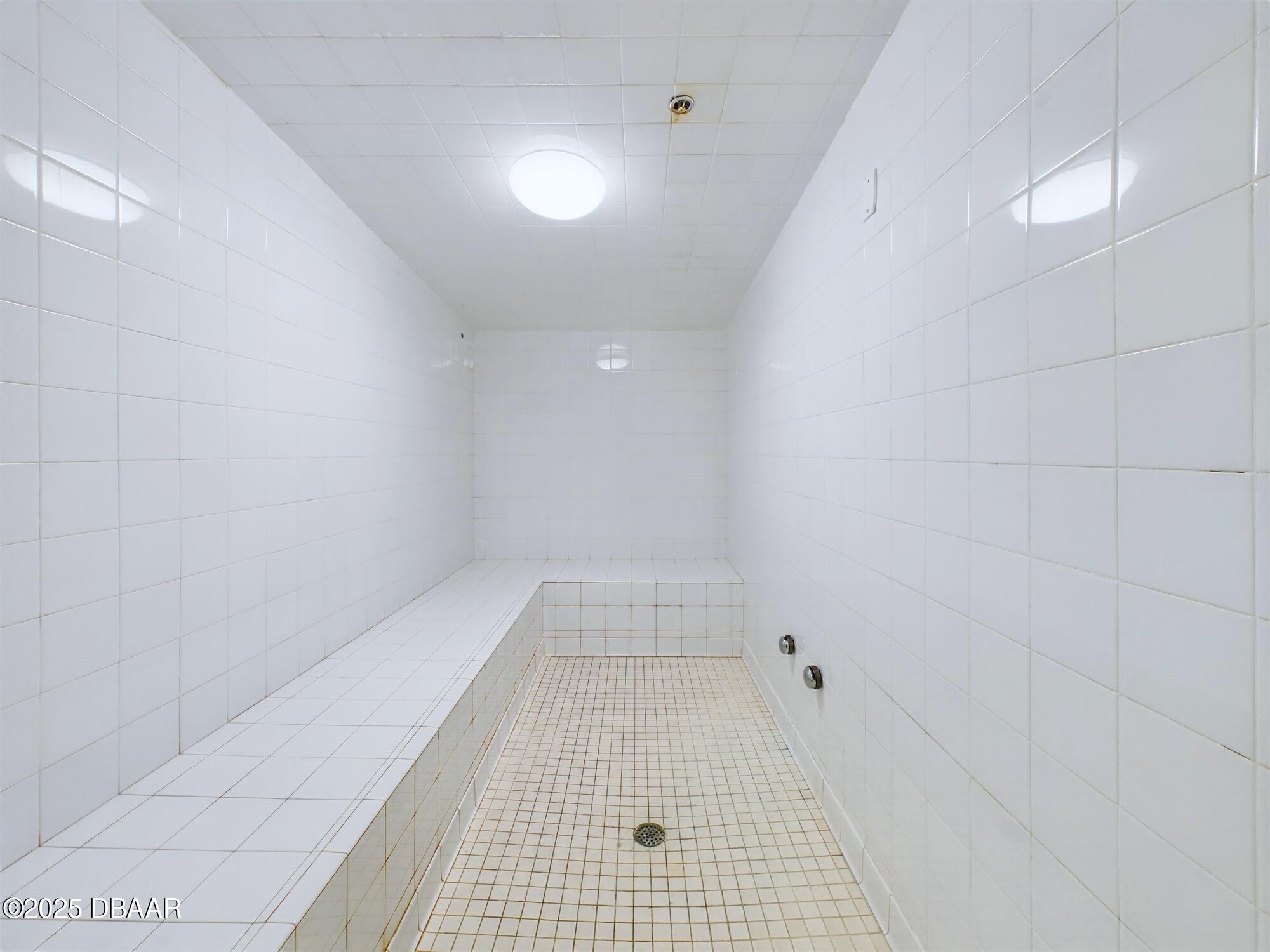 4670 Links Village Drive, Unit C601 Ponce Inlet, FL 32127 - Photo 62 of 68 a view of empty room with white walls