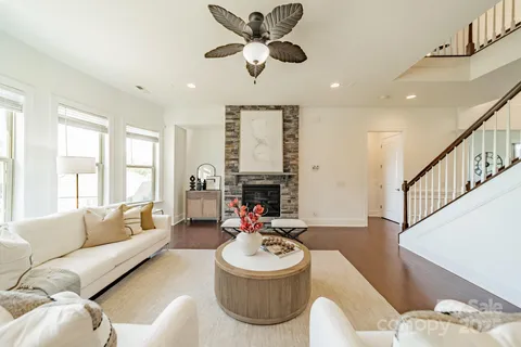 a view of an empty room with stairs