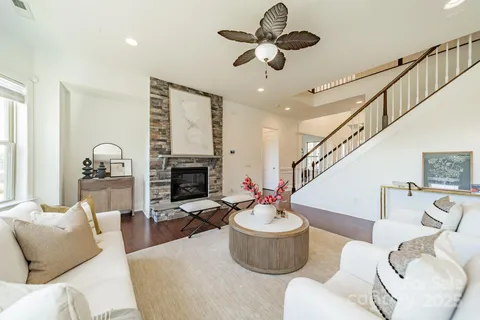 an empty room with a empty space and windows