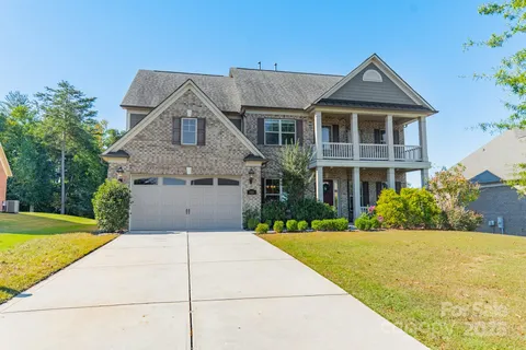 a hallway with washer and dryer