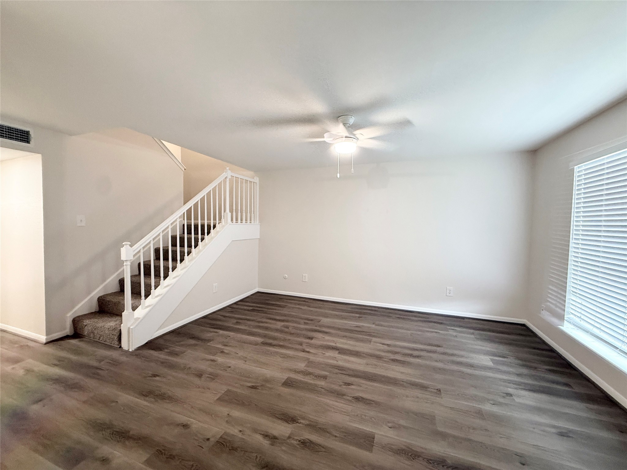1477 Springrock Lane, Unit 12 Houston, TX 77055 - Photo 5 of 24 a view of an entryway with wooden floor