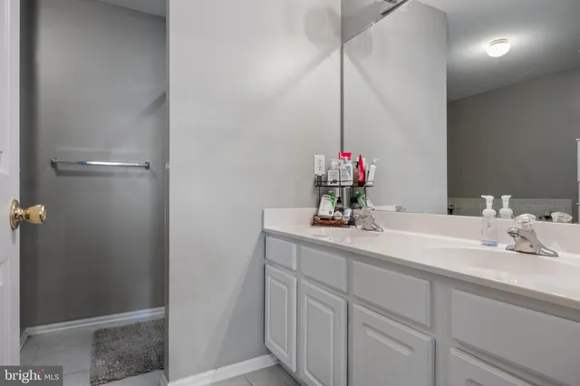 a bathroom with a toilet and a sink