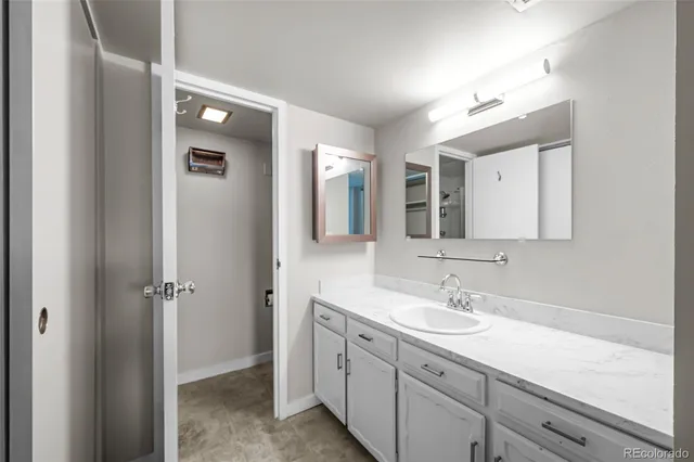 a view of a patio with a dining table and chairs