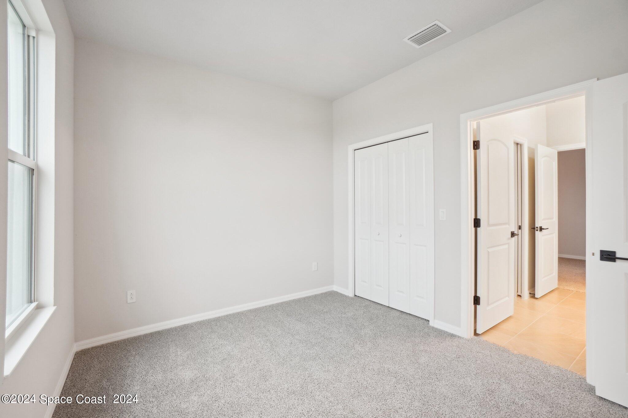 3019 Pangea Circle Melbourne, FL 32940 - Photo 19 of 56 a view of an empty room