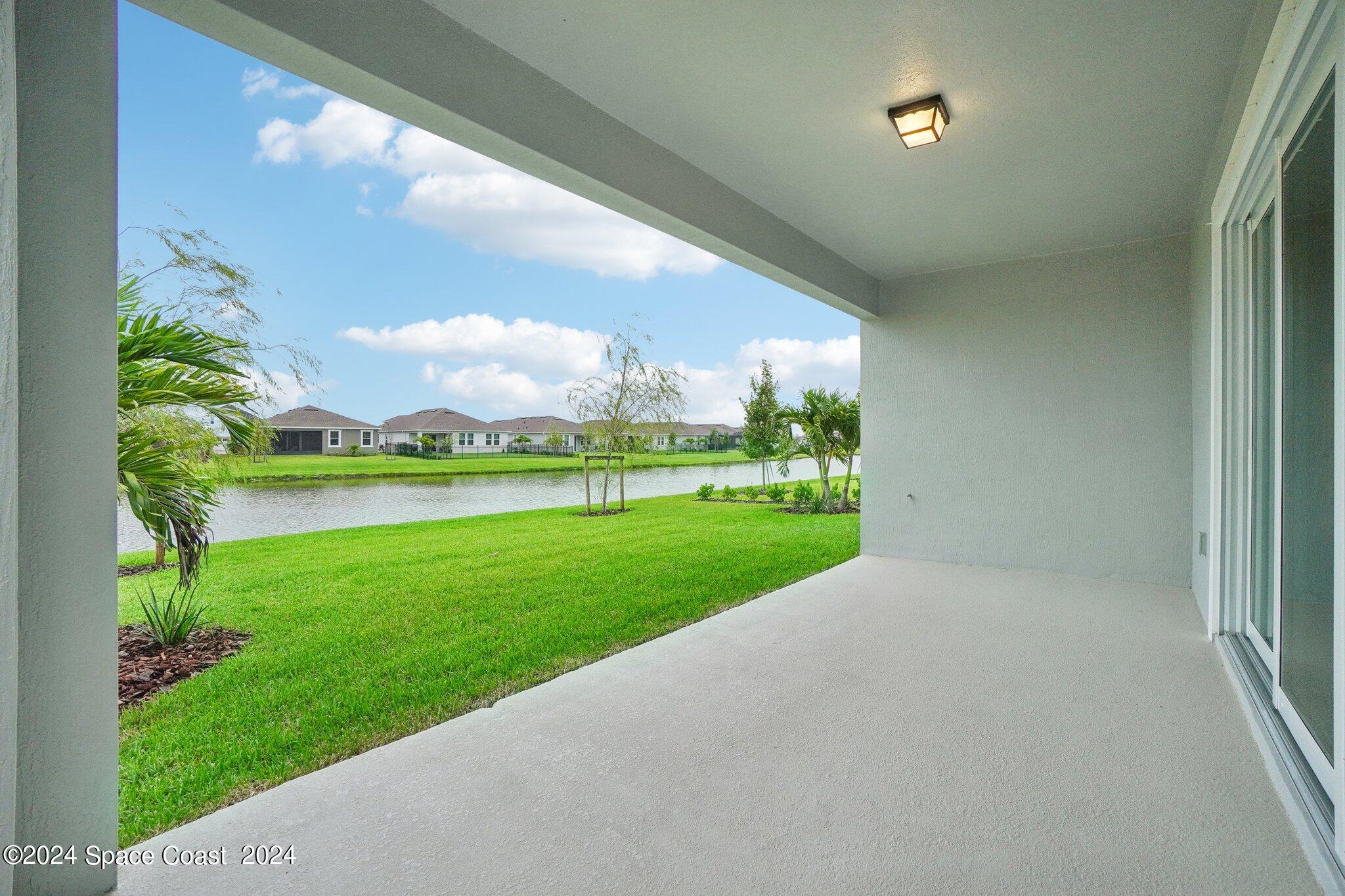 3019 Pangea Circle Melbourne, FL 32940 - Photo 50 of 56 a view of building with yard