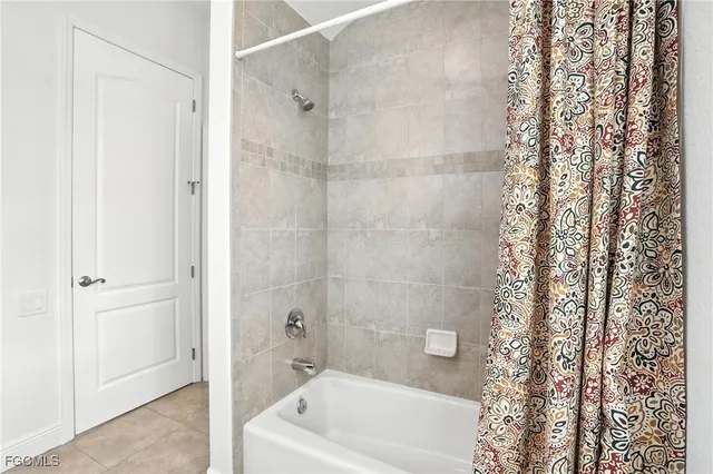 a view of storage and utility room with washer and dryer